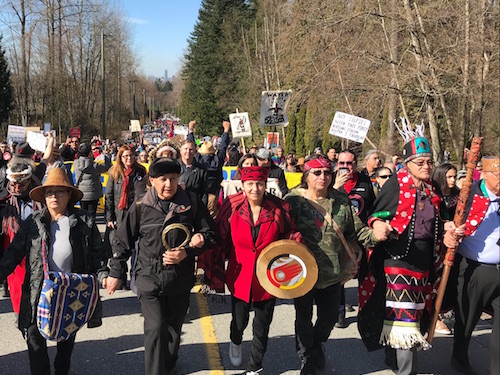 Grand Chief Stewart Phillip, second from left, at a protest on March 12, 2018. (Photo: @CoastProtectors/Twitter)